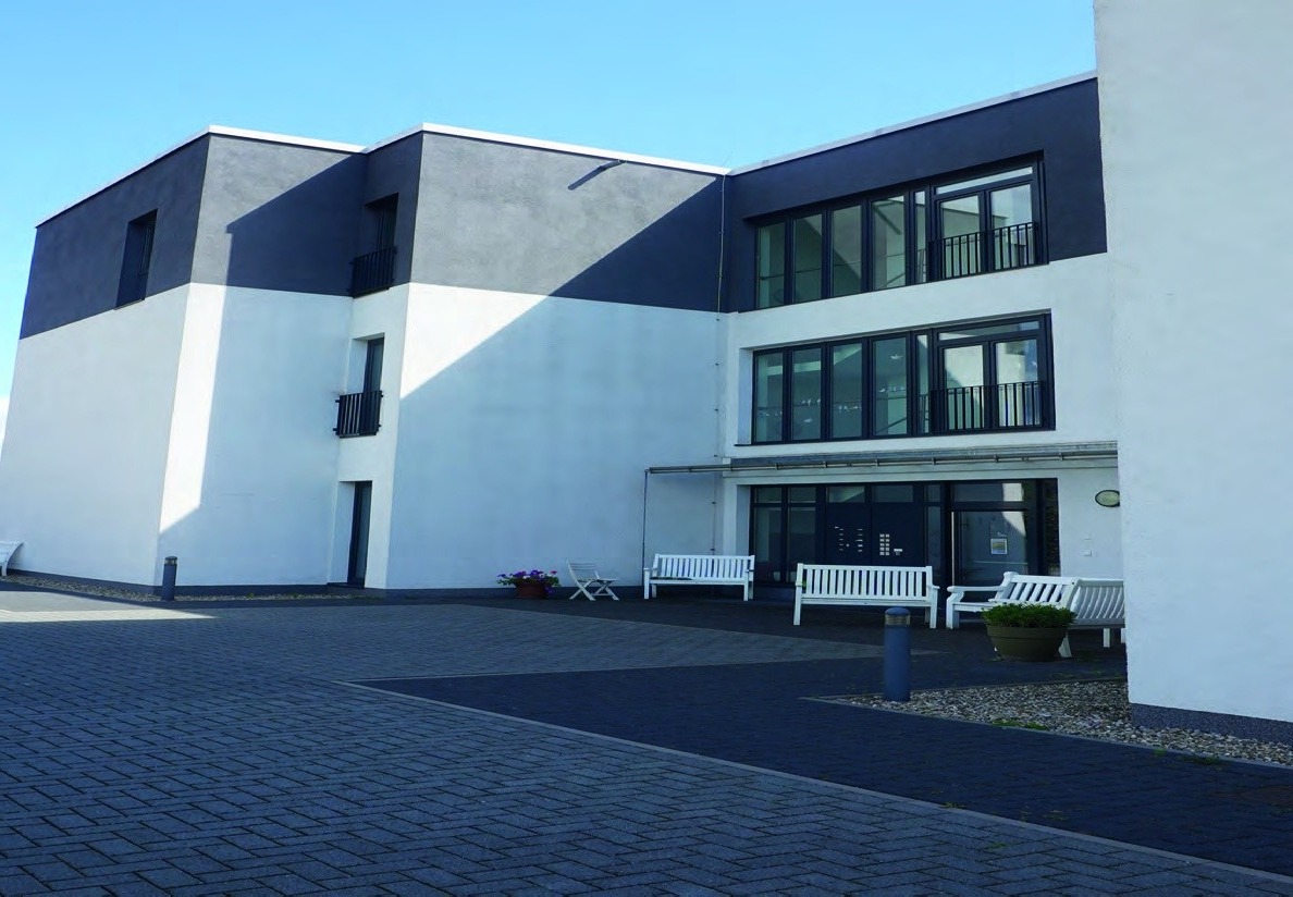 Eingangsbereich und Innenhof An den Hainbuchen